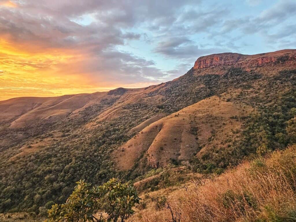Scenic view of Wolwekrans mountain range during sunset with vibrant sky.